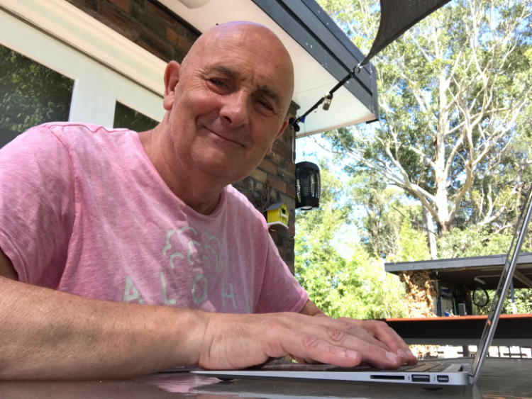 Bruce Smith typing outside